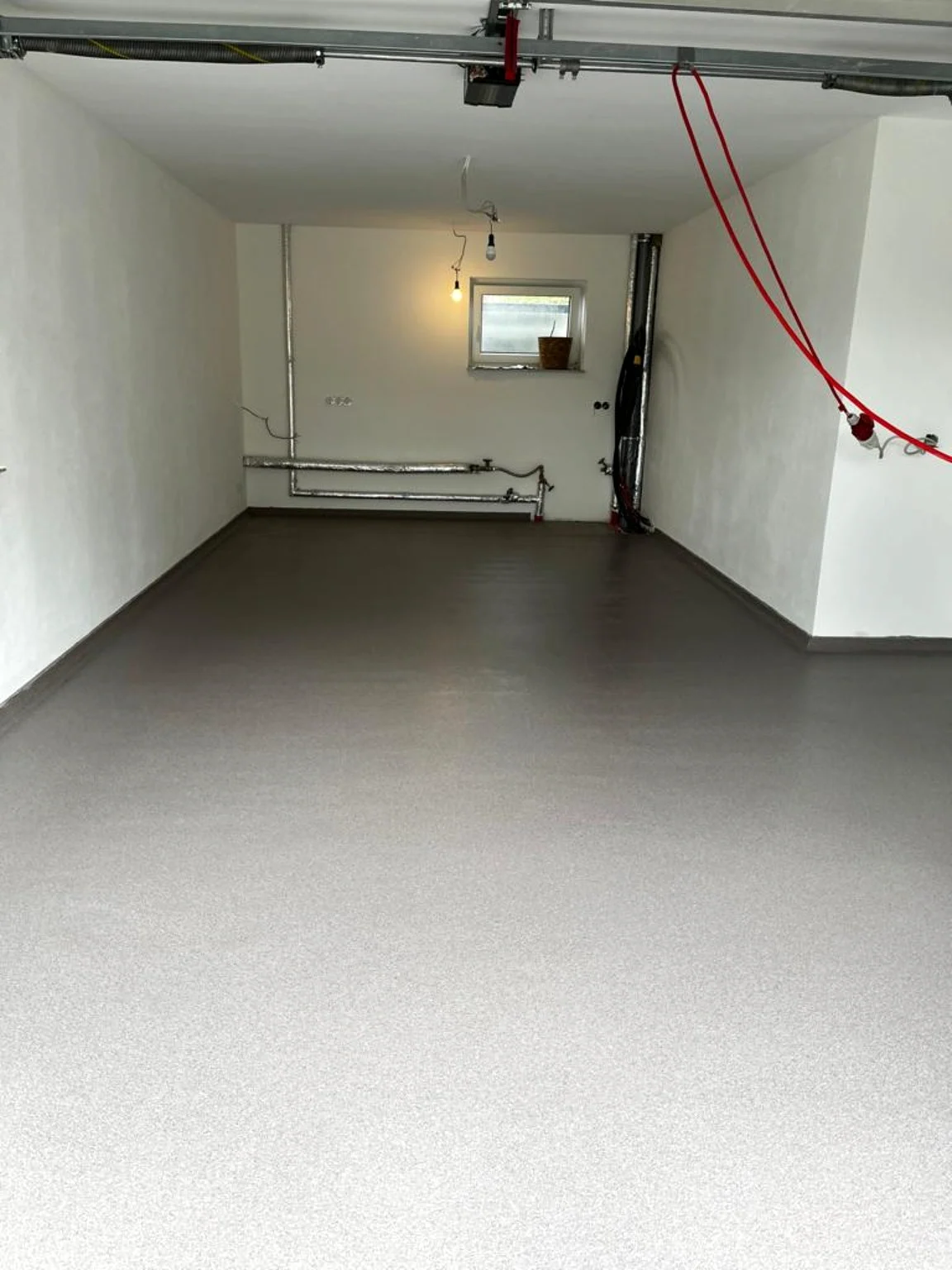 Uitgevoerd project: Polyaspartic garagevloer van circa 60 m²